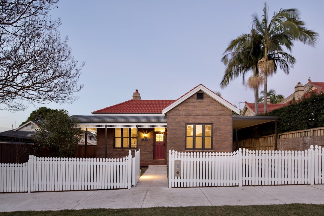 a house with a white picket fence - How to refinance my mortgage in 2026?