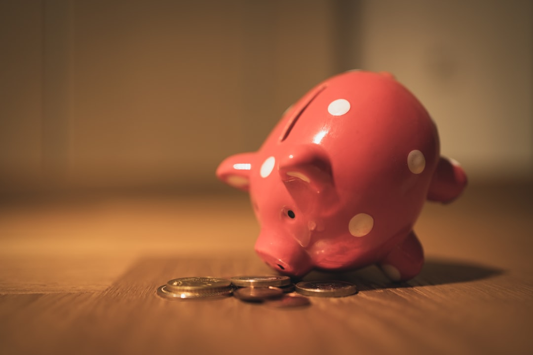 pink pig coin bank on brown wooden table - What is the 2026 super contribution cap?